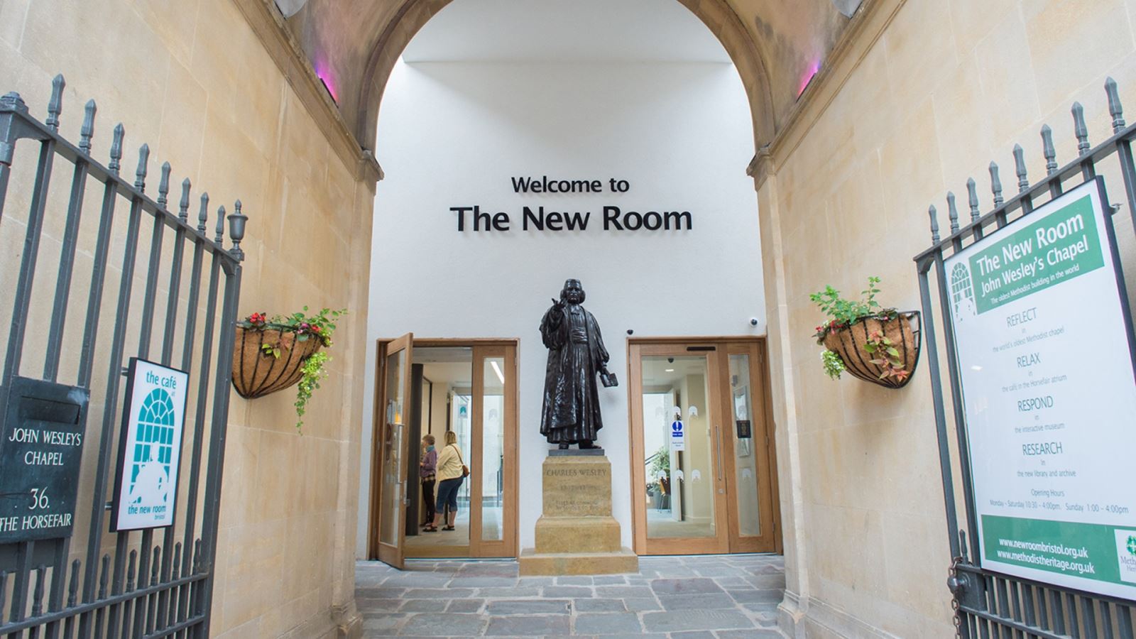 Entrance to The New Room in Bristol and Charles Wesley statue